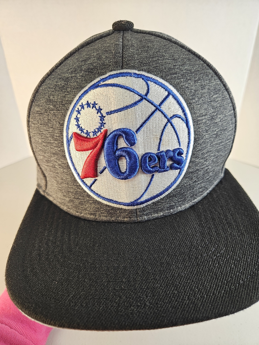 New Era Philadelphia 76ers Gray and Black Snapback Hat with Red and Blue Logo